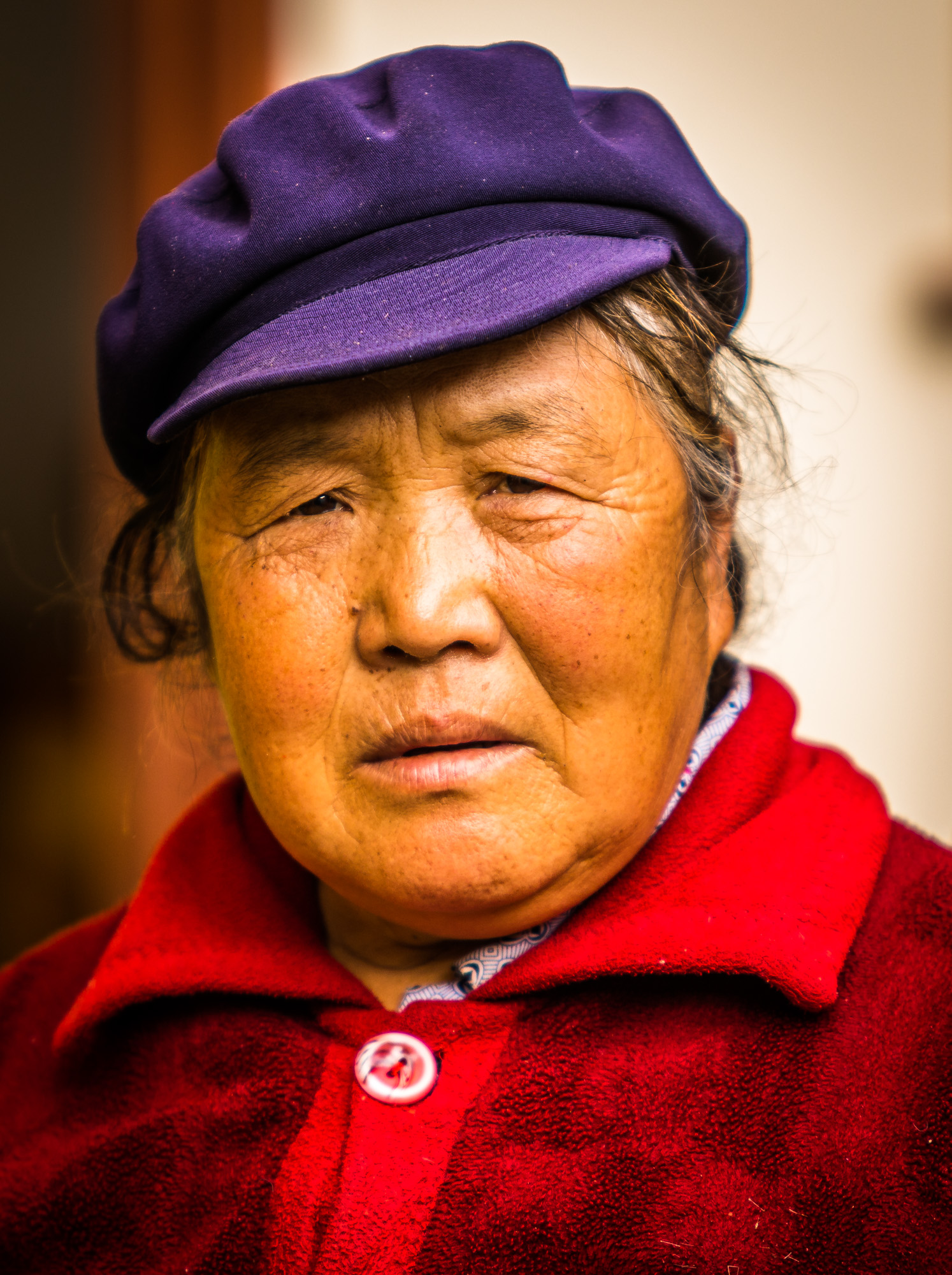 old naxi woman, lijiang, yunnan, china